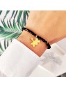 Bransoletka z naturalnego onyksu z zawieszką puzzel z grawerem Bransoletka z naturalnego onyksu z zawieszką puzzel z grawerem