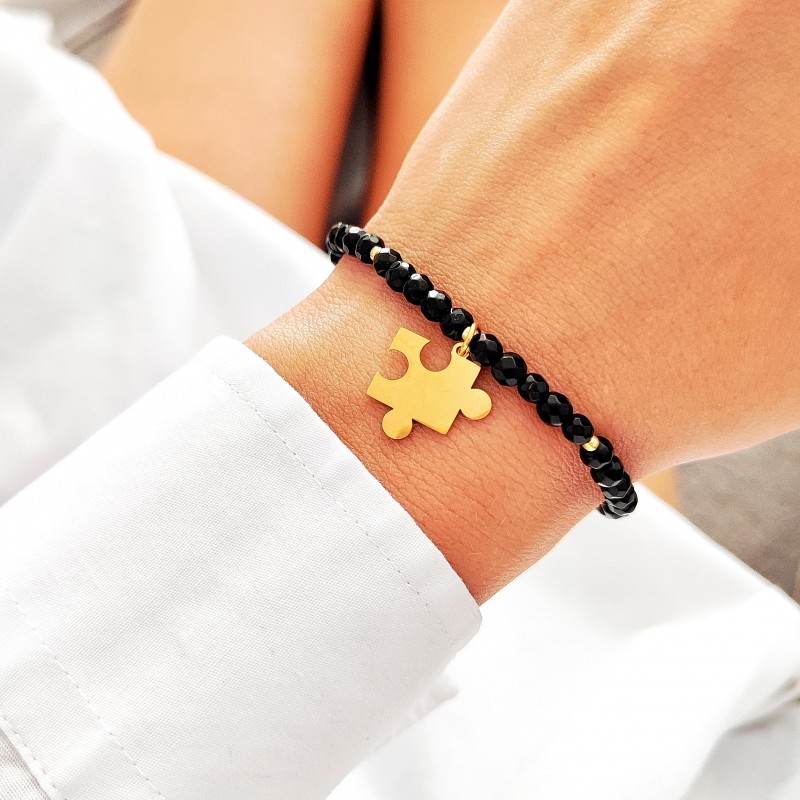 Bransoletka z kamieni naturalnych Onyks z puzzlem z grawerem. Bransoletka z kamieni naturalnych Onyks z puzzlem z grawerem.