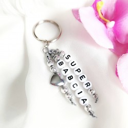 srebrny brelok z imieniem lub napisem