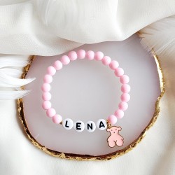 Bransoletka z imieniem dziecka z koralików różowa z misiem