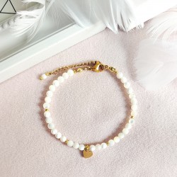 Bransoletka z masy perłowej z zawieszką złote serduszko