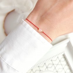 Bransoletka na szczęście z kamieniem naturalnym Kwarc Różowy na czerwonym sznurku