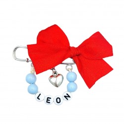 Broszka agrafka z czerwoną kokardką z imieniem dziecka