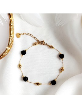 Bransoletka złota z czarnymi kamieniami zapinana Stal