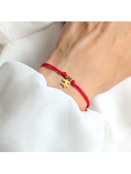 Bransoletka z zawieszką złoty puzzel na czerwonym sznurku