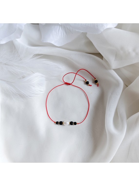 Bransoletka na szczęście z onyksem i perłą