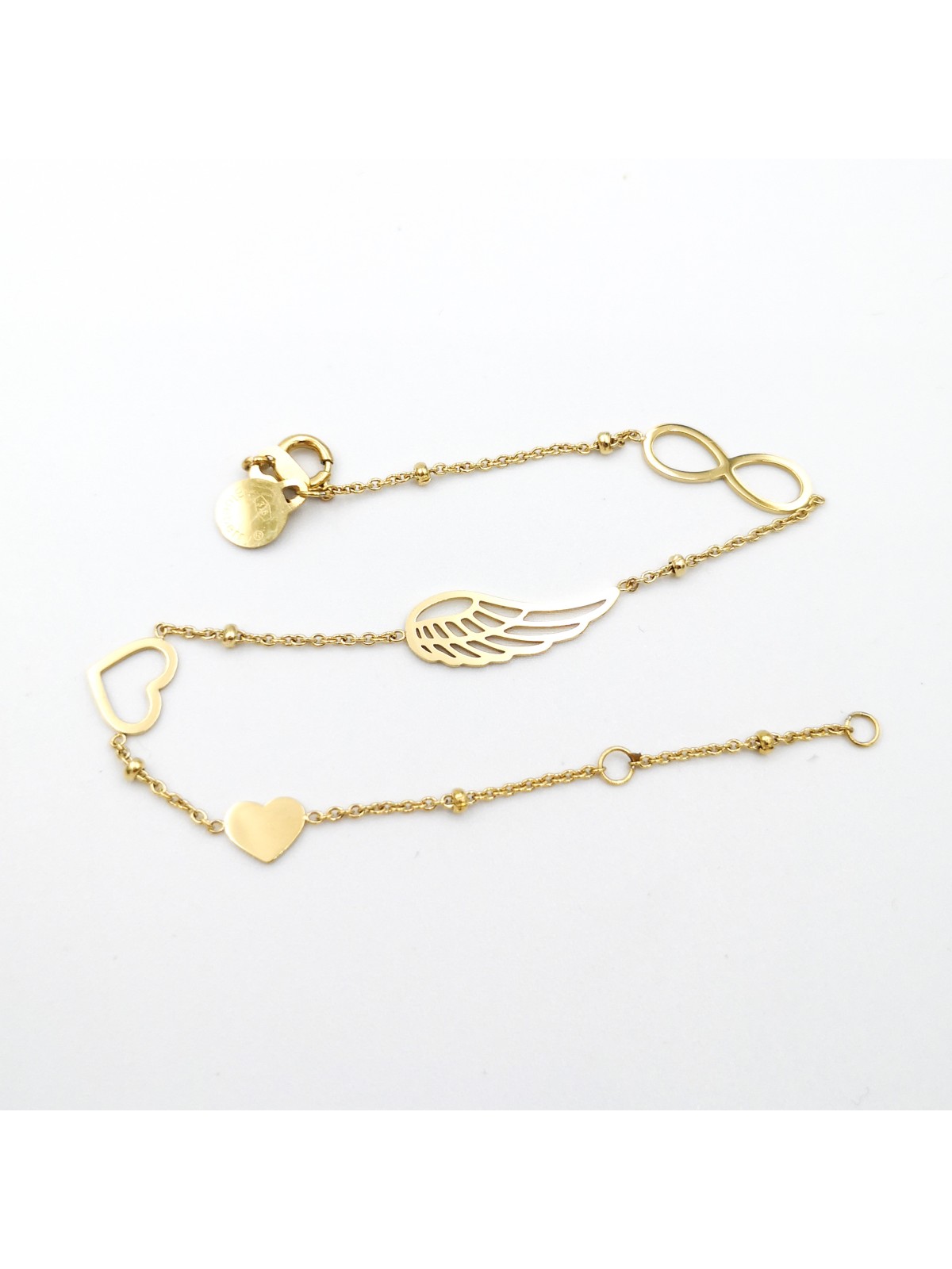 Złota bransoletka z zawieszkami charms