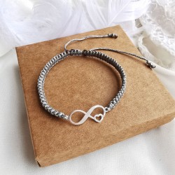 Bransoletka ze znakiem nieskończoności i serduszkiem na sznurku pleciona