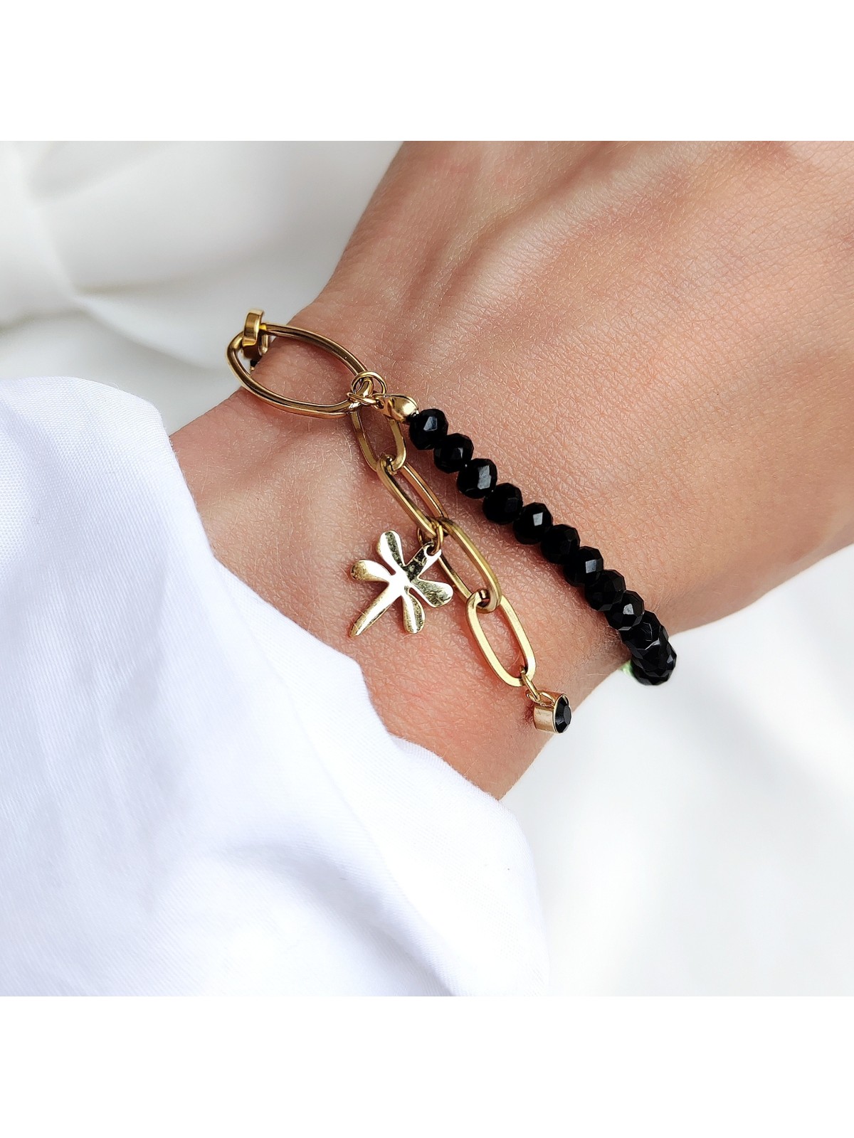 Bransoletka z połyskujących kryształków i stali chirurgicznej Bransoletka z połyskujących kryształków i stali chirurgicznej