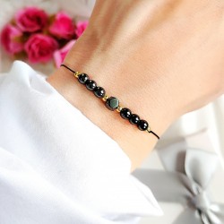 Bransoletka z grafitowym hematytem na czarnym sznurku