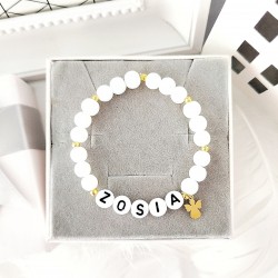 Biała bransoletka z imieniem dziecka z zawieszką aniołek