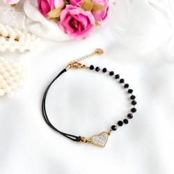 Bransoletka ze złotym serduszkiem na sznurku z czarnymi kamieniami